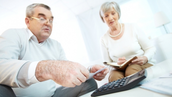 Путин подписал закон о доплатах инвалидам и пенсионерам