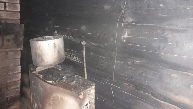 Неравнодушные соседи вывели из горящего дома пожилую женщину